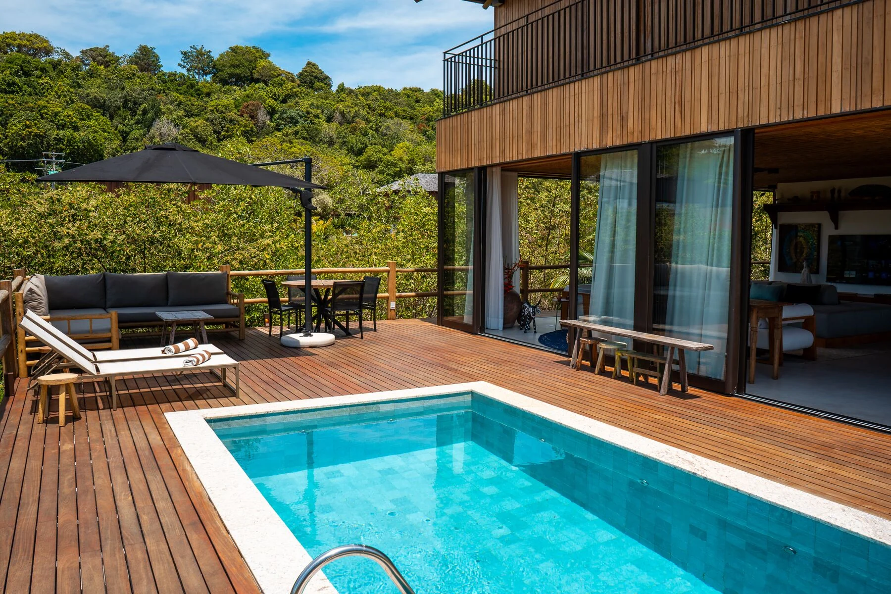 Piscina e deck da Casa 118